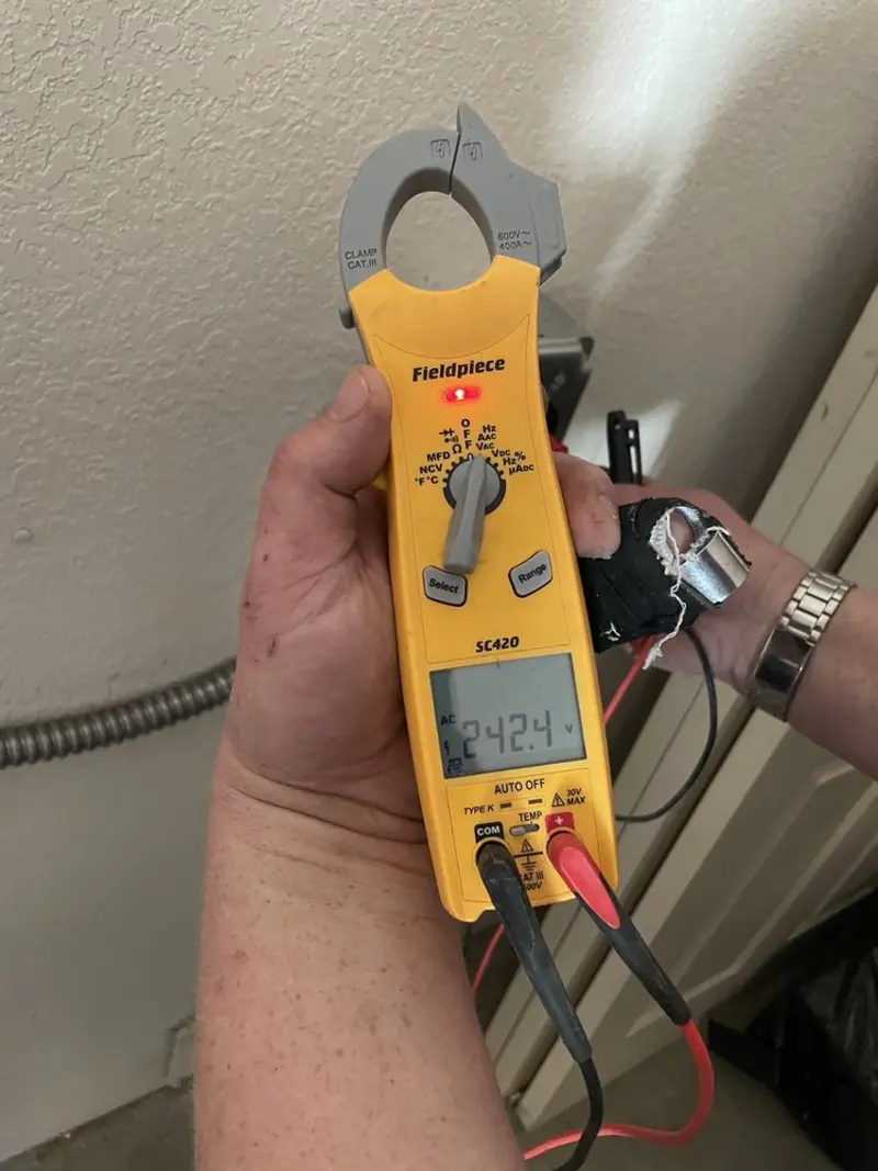 Voltage testing with clamp meter during Whole House Surge Protector in Lordstown